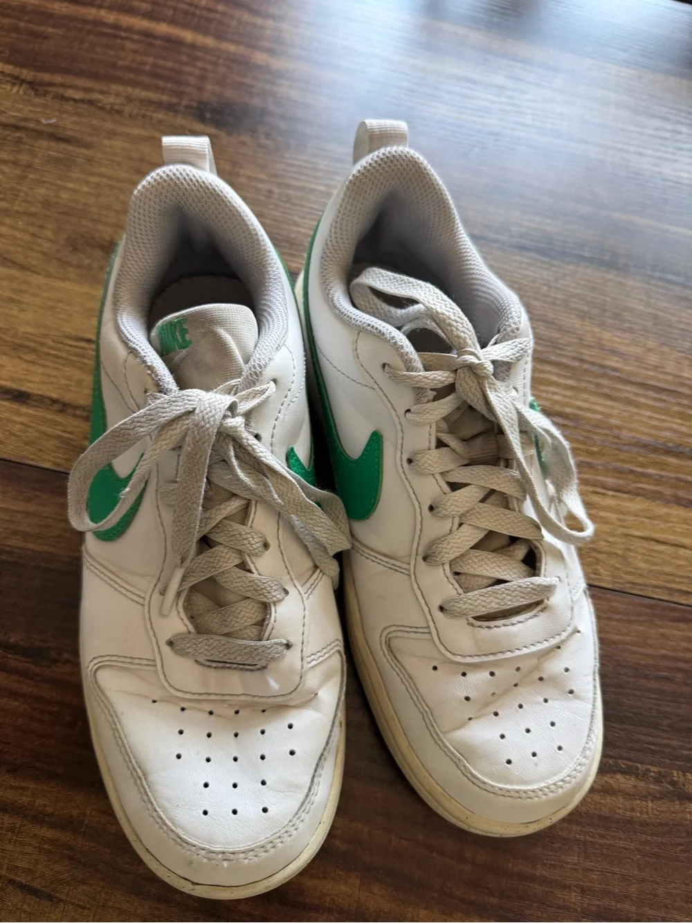 Nike White Low-Top Sneakers with Green Swoosh